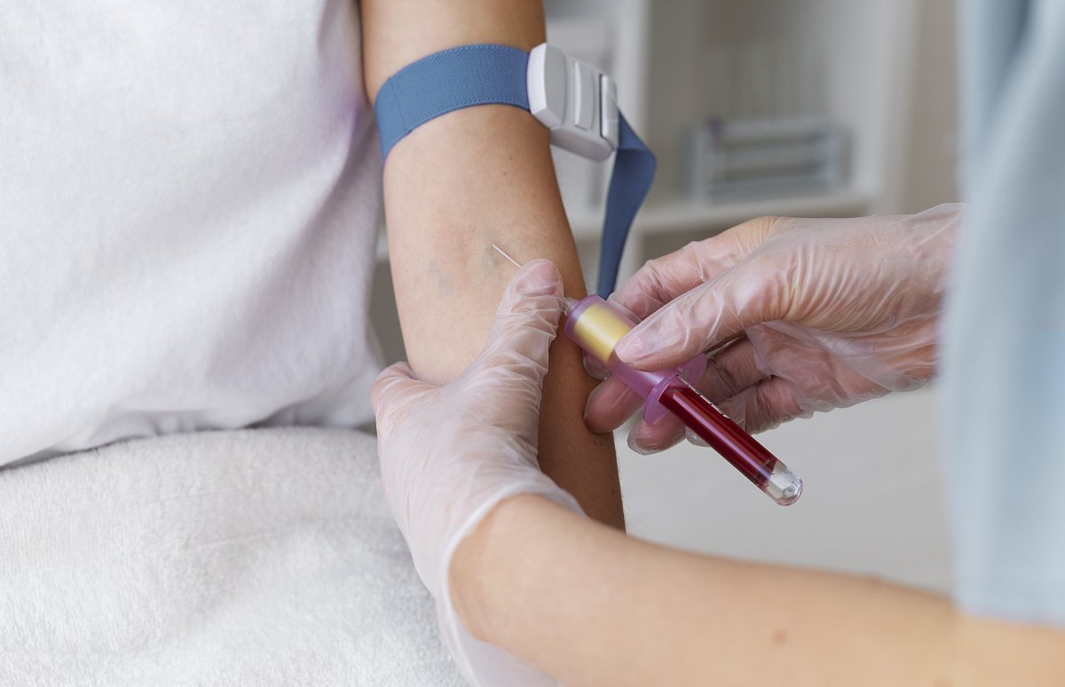 high-angle-health-professional-drawing-blood.jpg